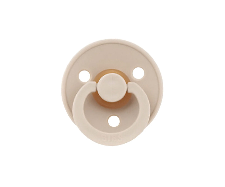 Chupete redondo de color beige de la marca danesa BIBS 
