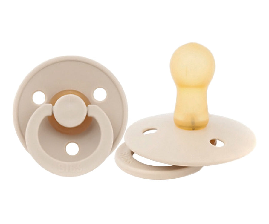 Chupete redondo de color beige de la marca danesa BIBS 